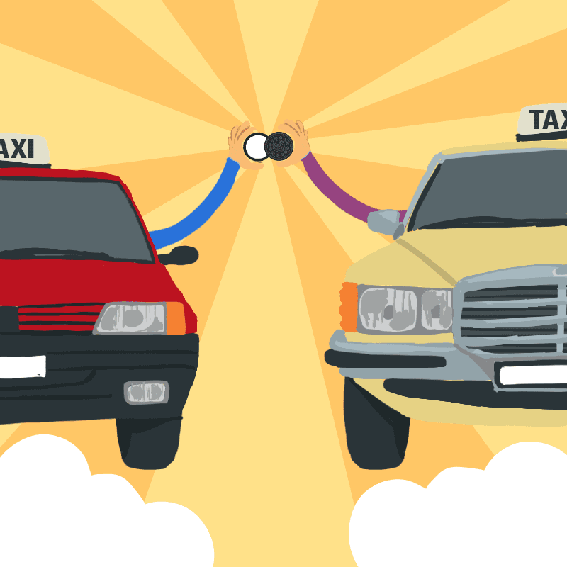 Oreo mascot high-fiving between two taxis