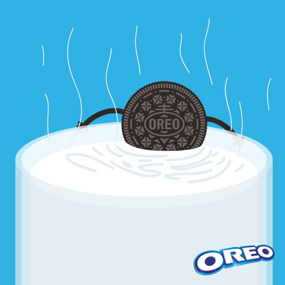 Oreo mascot splashing into a glass of milk